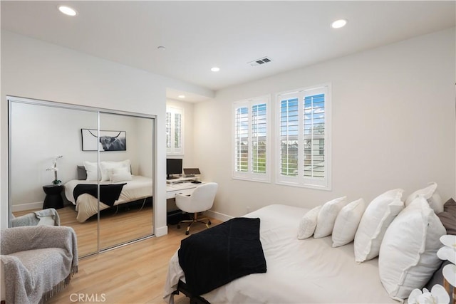 2294 Pacific Ave, Costa Mesa, CA 92627 - bedroom featuring light wood-style floors, recessed lighting, baseboards, and a closet