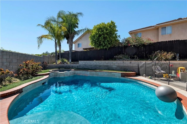 13909 Mountain View Pl, Sylmar, CA 91342 - view of pool featuring a fenced backyard and a pool with connected hot tub