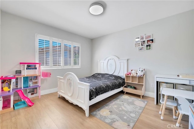 13909 Mountain View Pl, Sylmar, CA 91342 - bedroom with wood finished floors and baseboards