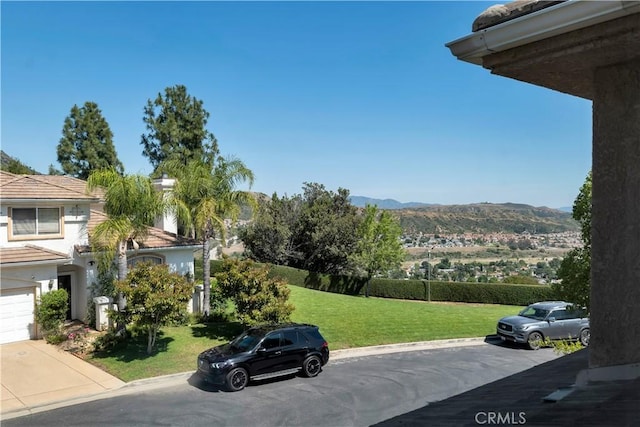 13909 Mountain View Pl, Sylmar, CA 91342 - exterior view of mountains and stucco siding
