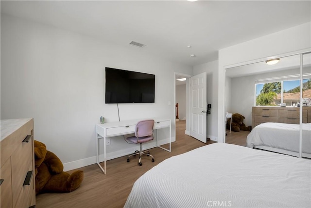 13909 Mountain View Pl, Sylmar, CA 91342 - bedroom featuring wood finished floors and baseboards
