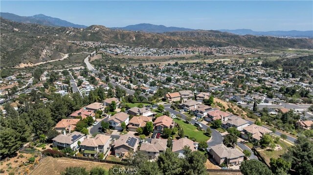 13909 Mountain View Pl, Sylmar, CA 91342 - aerial overview of property's location with a mountainous background and nearby suburban area