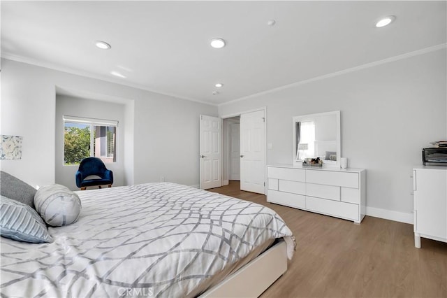 13909 Mountain View Pl, Sylmar, CA 91342 - bedroom with ornamental molding, wood finished floors, recessed lighting, and baseboards