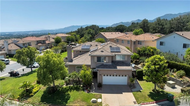 13909 Mountain View Pl, Sylmar, CA 91342 - aerial perspective of suburban area with a mountain backdrop