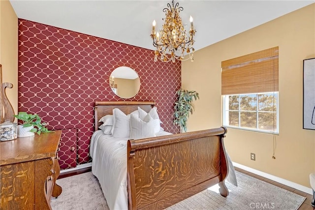 23848 Skyline, Mission Viejo, CA 92692 - bedroom featuring baseboards, a chandelier, and an accent wall
