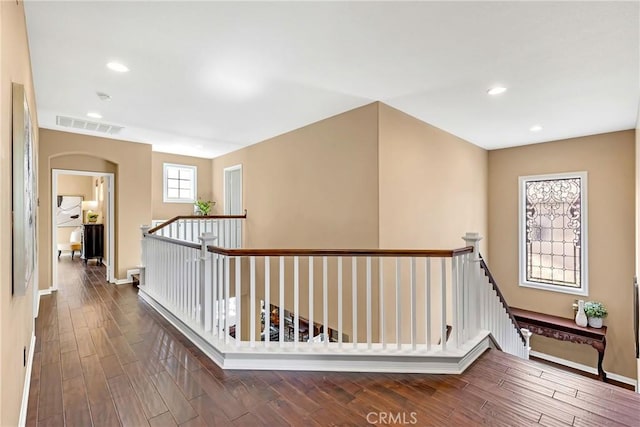 23848 Skyline, Mission Viejo, CA 92692 - corridor featuring wood finished floors, arched walkways, baseboards, an upstairs landing, and recessed lighting