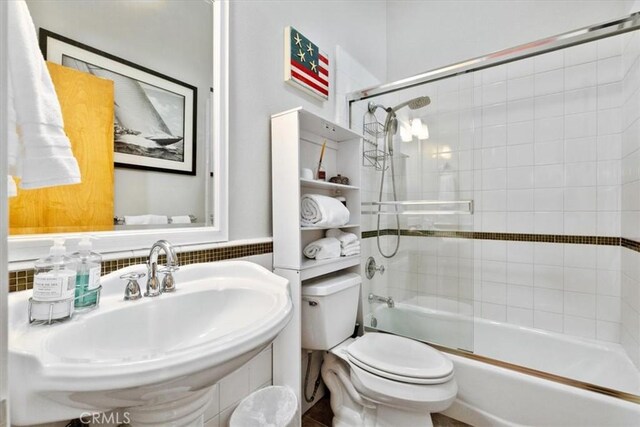 223 San Miguel St, Avila Beach, CA 93424 - full bathroom with a sink, toilet, and enclosed tub / shower combo