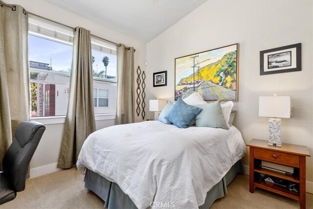 223 San Miguel St, Avila Beach, CA 93424 - bedroom featuring carpet, lofted ceiling, and baseboards