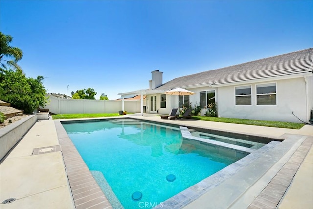 39654 Bordeaux Pl, Murrieta, CA 92562 - view of swimming pool featuring a fenced backyard, a pool with connected hot tub, and a patio area