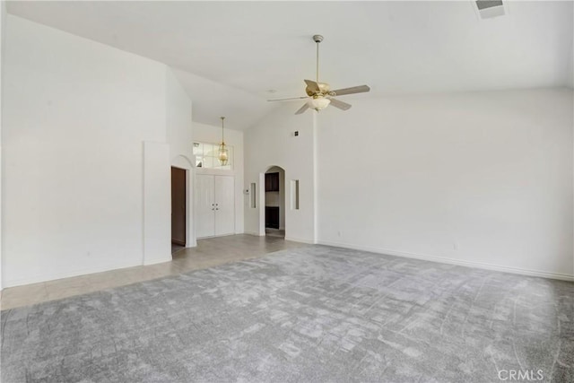 39654 Bordeaux Pl, Murrieta, CA 92562 - carpeted spare room featuring arched walkways, ceiling fan, high vaulted ceiling, and baseboards