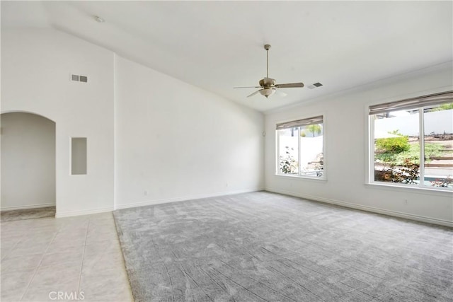 39654 Bordeaux Pl, Murrieta, CA 92562 - spare room with a ceiling fan, healthy amount of natural light, lofted ceiling, arched walkways, and baseboards