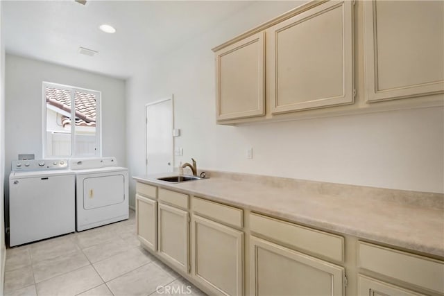 39654 Bordeaux Pl, Murrieta, CA 92562 - washroom with washing machine and clothes dryer, cabinet space, light tile patterned floors, and recessed lighting