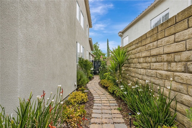 11771 Coorsgold Ln, Porter Ranch, CA 91326 - view of home's exterior with stucco siding