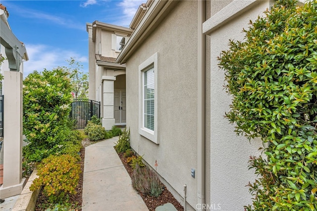 11771 Coorsgold Ln, Porter Ranch, CA 91326 - doorway to property featuring stucco siding