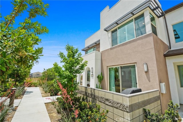 3590 E Peckham Paseo Unit 6, Ontario, CA 91761 - view of side of property with stucco siding