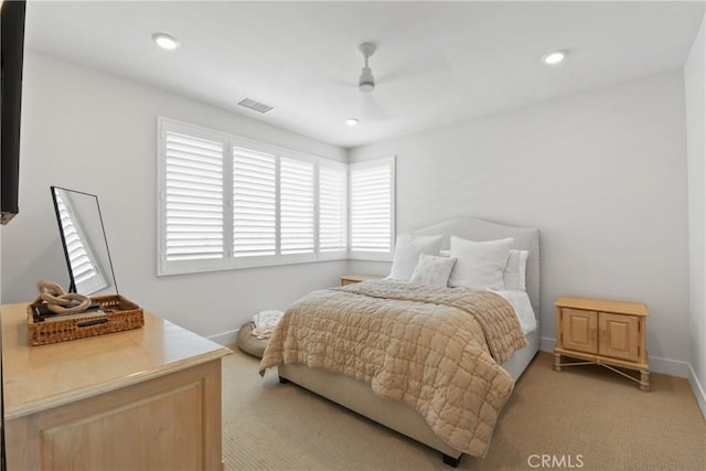 3590 E Peckham Paseo Unit 6, Ontario, CA 91761 - bedroom with light colored carpet, a ceiling fan, and recessed lighting