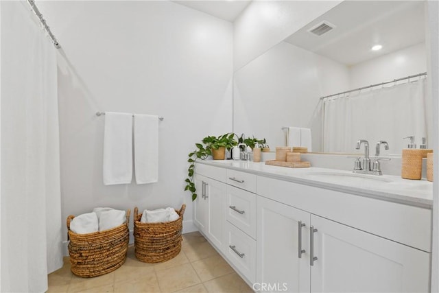 3590 E Peckham Paseo Unit 6, Ontario, CA 91761 - full bathroom with vanity, tile patterned floors, and a shower with shower curtain