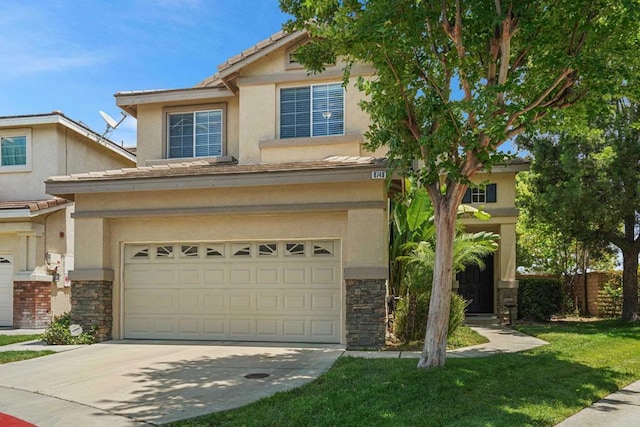 8749 Fairoaks Ct, Rancho Cucamonga, CA 91730 - view of front of home with stone siding, a garage, stucco siding, and concrete driveway