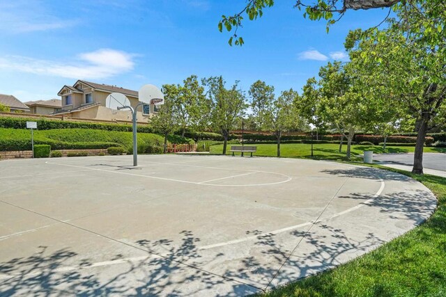 8749 Fairoaks Ct, Rancho Cucamonga, CA 91730 - view of basketball court featuring community basketball court and a lawn