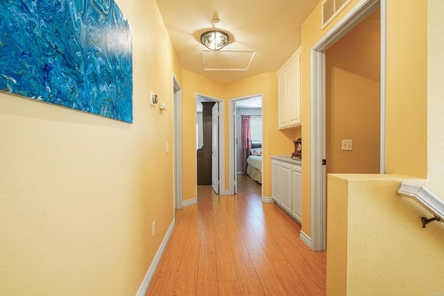 8749 Fairoaks Ct, Rancho Cucamonga, CA 91730 - corridor featuring light wood finished floors and baseboards