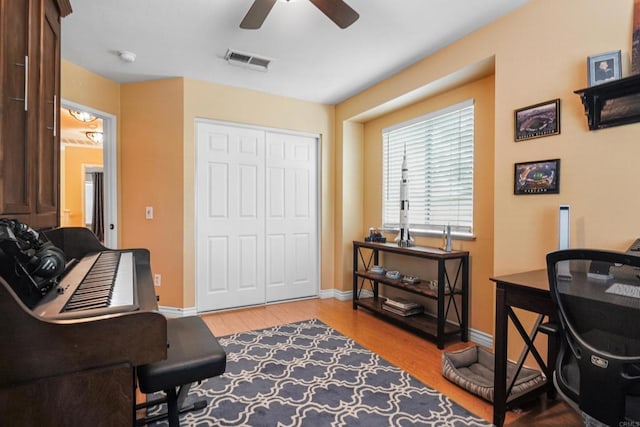 8749 Fairoaks Ct, Rancho Cucamonga, CA 91730 - office featuring a ceiling fan, wood finished floors, and baseboards