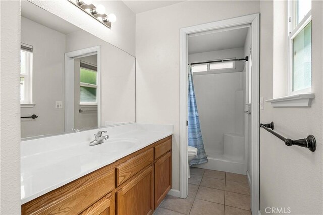 1377 Lucy Way, Chico, CA 95973 - bathroom with toilet, vanity, a shower with shower curtain, and tile patterned floors