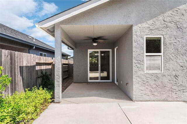 1377 Lucy Way, Chico, CA 95973 - property entrance featuring a ceiling fan, stucco siding, and a patio