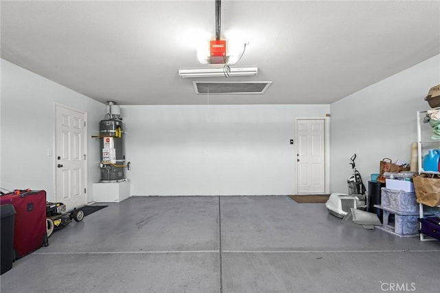 1377 Lucy Way, Chico, CA 95973 - garage with secured water heater and a garage door opener