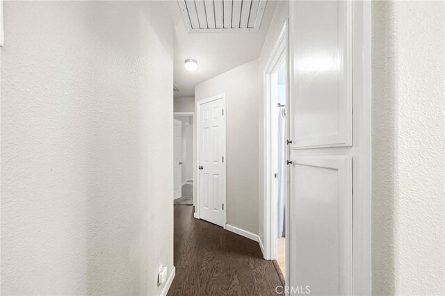 1377 Lucy Way, Chico, CA 95973 - corridor featuring dark wood-style floors, baseboards, and attic access