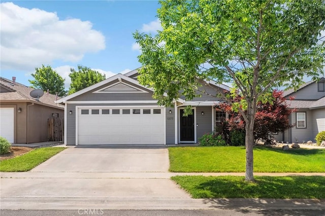 1377 Lucy Way, Chico, CA 95973 - ranch-style home with driveway, a front yard, and a garage