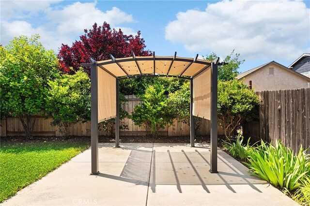 1377 Lucy Way, Chico, CA 95973 - fenced backyard with a patio area and a pergola