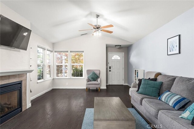 1377 Lucy Way, Chico, CA 95973 - living room featuring a tiled fireplace, wood finished floors, a ceiling fan, lofted ceiling, and baseboards