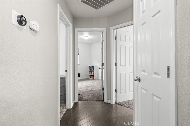 1377 Lucy Way, Chico, CA 95973 - hall featuring dark wood-type flooring and baseboards
