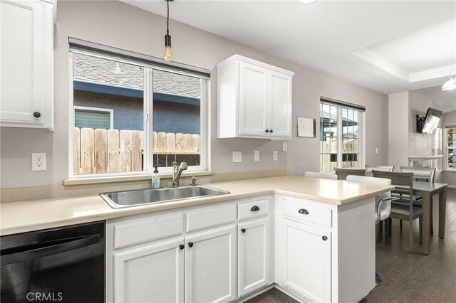 1377 Lucy Way, Chico, CA 95973 - kitchen featuring dishwasher, a sink, a peninsula, and white cabinets