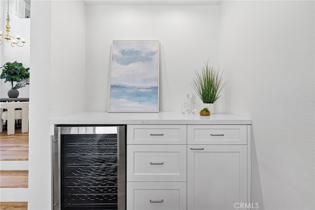431 Cranston Ct Unit 102, Long Beach, CA 90803 - indoor dry bar featuring beverage cooler and a chandelier