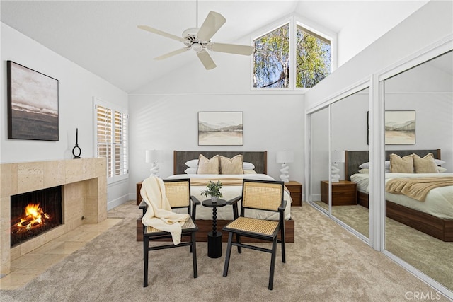 431 Cranston Ct Unit 102, Long Beach, CA 90803 - bedroom featuring high vaulted ceiling, carpet floors, a fireplace, multiple closets, and ceiling fan