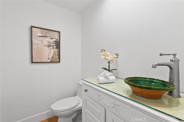 431 Cranston Ct Unit 102, Long Beach, CA 90803 - half bathroom featuring toilet and vanity