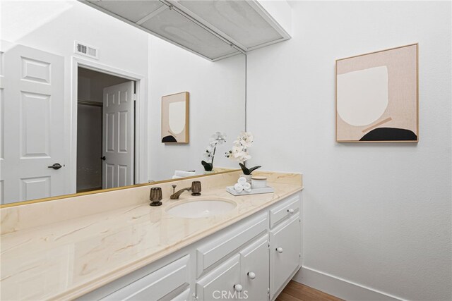 431 Cranston Ct Unit 102, Long Beach, CA 90803 - bathroom featuring vanity and wood finished floors