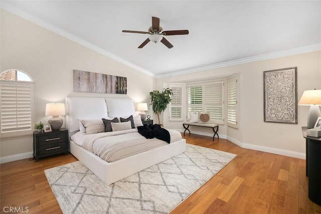 27692 Motherlode Ct, Laguna Niguel, CA 92677 - bedroom featuring lofted ceiling, wood finished floors, ornamental molding, and ceiling fan