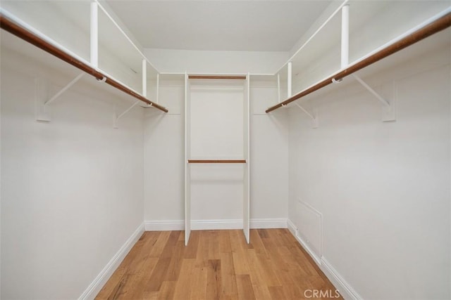 27692 Motherlode Ct, Laguna Niguel, CA 92677 - walk in closet featuring light wood finished floors