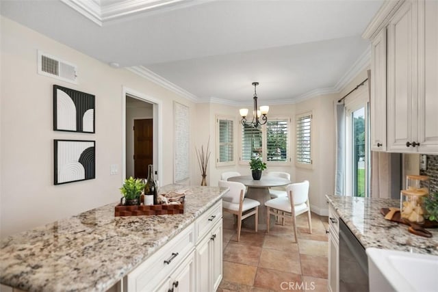27692 Motherlode Ct, Laguna Niguel, CA 92677 - kitchen with crown molding, a chandelier, stainless steel dishwasher, light stone countertops, and hanging light fixtures