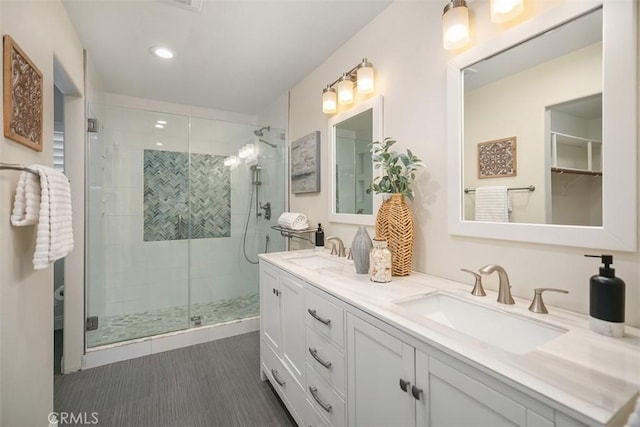 27692 Motherlode Ct, Laguna Niguel, CA 92677 - bathroom with double vanity, a shower stall, and recessed lighting