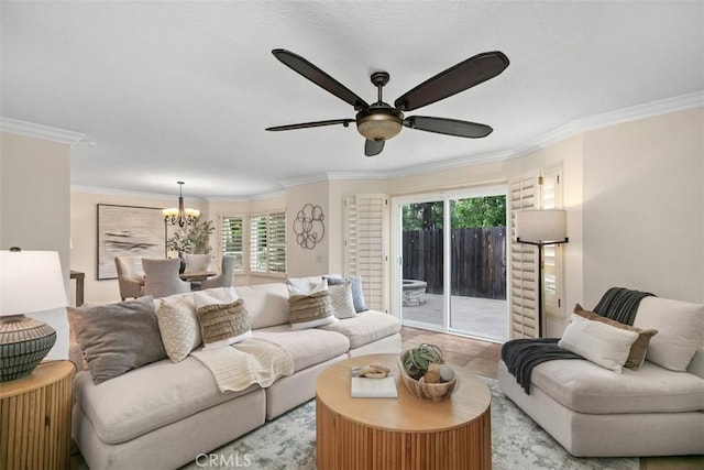27692 Motherlode Ct, Laguna Niguel, CA 92677 - living room featuring ornamental molding, a ceiling fan, a chandelier, and healthy amount of natural light