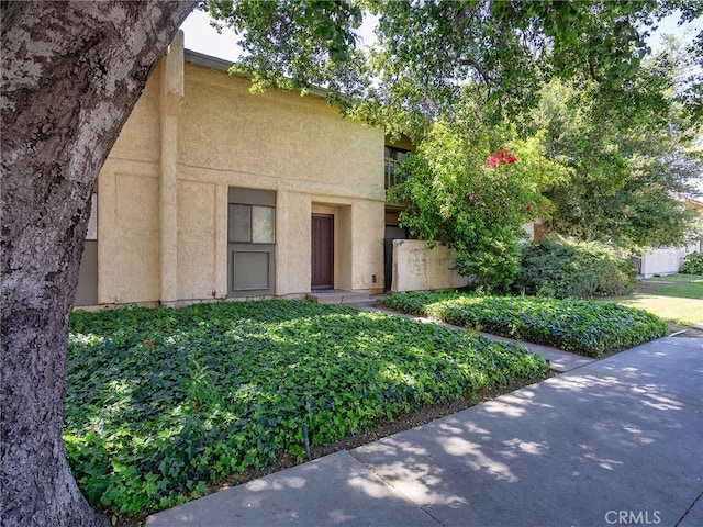 20807 Roscoe Blvd Unit 5, Winnetka, CA 91306 - view of front of home with stucco siding