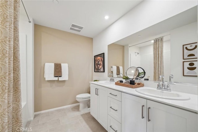 16183 Lumia Way, Fontana, CA 92336 - full bath with double vanity, toilet, and baseboards