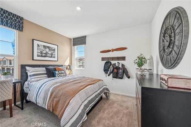 16183 Lumia Way, Fontana, CA 92336 - bedroom with carpet, multiple windows, and baseboards