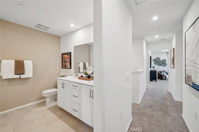 16183 Lumia Way, Fontana, CA 92336 - bathroom with vanity, baseboards, toilet, and recessed lighting
