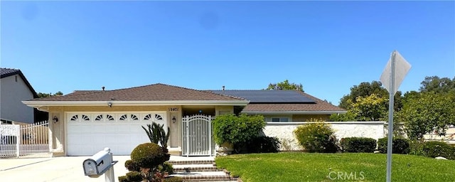 19401 Twin Hills Pl, Porter Ranch, CA 91326 - single story home with driveway, a garage, solar panels, and a gate