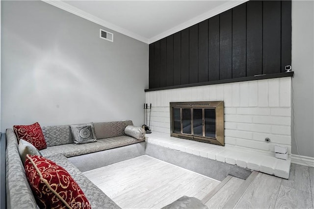 19401 Twin Hills Pl, Porter Ranch, CA 91326 - living room with a brick fireplace, wood finished floors, and ornamental molding