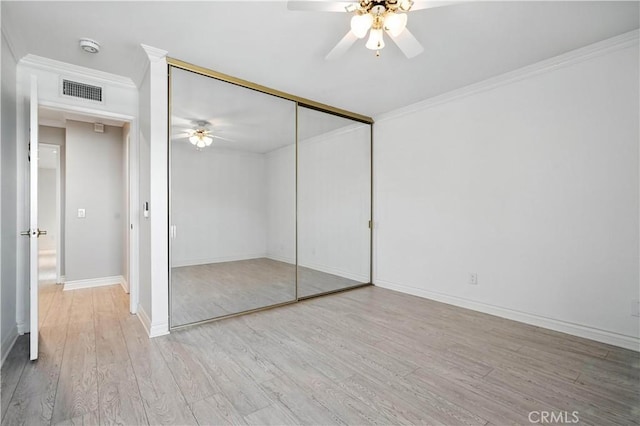 19401 Twin Hills Pl, Porter Ranch, CA 91326 - unfurnished bedroom with wood finished floors, crown molding, a closet, and ceiling fan